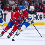 May 16, 2026; Montreal, Quebec, CAN; Montreal Canadiens defenseman Alexandre Carrier (45) plays the puck against Buffalo Sabres right wing Alex Tuch (89) during the second period in game six of the second round of the 2026 Stanley Cup Playoffs at Bell Centre.