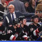 Apr 5, 2025; Buffalo, New York, USA; Buffalo Sabres head coach Lindy Ruff talks to his team during the second period against the Tampa Bay Lightning at KeyBank Center.