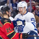 Mar 21, 2026; Ottawa, Ontario, CAN; Ottawa Senators left wing Fabian Zetterlund (20) exchanges words with Toronto Maple Leafs defenseman Brandon Carlo (25) in the first period at the Canadian Tire Centre. Mandatory Credit: Marc DesRosiers-IMAGN Images