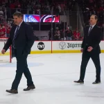 May 16, 2024; Raleigh, North Carolina, USA; New York Rangers head coach Peter Laviolette and assistant coach Phil Housley walk off the ice after the 1st period against the Carolina Hurricanes in game six of the second round of the 2024 Stanley Cup Playoffs at PNC Arena. Mandatory Credit: James Guillory-Imagn Images