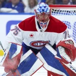 Apr 21, 2026; Tampa, Florida, USA; Montreal Canadiens goaltender Jakub Dobes (75) looks on against the Tampa Bay Lightning in the first period during game two of the first round of the 2026 Stanley Cup Playoffs at Benchmark International Arena.