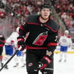 May 21, 2026; Raleigh, North Carolina, USA; Carolina Hurricanes defenseman Alexander Nikishin (21) skates after the puck against the Montreal Canadiens during the second period in game one of the Eastern Conferene Final of the 2026 Stanley Cup Playoffs at Lenovo Center. Mandatory Credit: James Guillory-Imagn Images