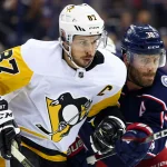 Feb 18, 2018; Columbus, OH, USA; Pittsburgh Penguins center Sidney Crosby (87) skates against Columbus Blue Jackets center Boone Jenner (38) in the second period at Nationwide Arena.
