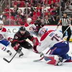May 21, 2026; Raleigh, North Carolina, USA; Montreal Canadiens goaltender Jakub Dobes (75) makes a save against Carolina Hurricanes left wing William Carrier (28) in game one of the Eastern Conferene Final of the 2026 Stanley Cup Playoffs at Lenovo Center. Mandatory Credit: James Guillory-Imagn Images