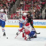 May 23, 2026; Raleigh, North Carolina, USA; Montréal Canadiens goaltender Jakub Dobes (75) makes a save during the third period against the Carolina Hurricanes in game two of the Eastern Conferene Final of the 2026 Stanley Cup Playoffs at Lenovo Center. Mandatory Credit: James Guillory-Imagn Images