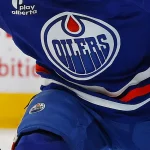 Jan 20, 2026; Edmonton, Alberta, CAN; Edmonton Oilers forward Issac Howard (53) chases a loose puck against the New Jersey Devils at Rogers Place.