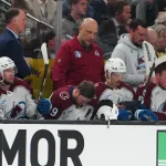 May 24, 2026; Las Vegas, Nevada, USA; Colorado Avalanche center Nathan MacKinnon (29) recovers on the bench after an injury during the second period against the Vegas Golden Knights in game three of the Western Conference Final of the 2026 Stanley Cup Playoffs at T-Mobile Arena. Mandatory Credit: Stephen R. Sylvanie-Imagn Images