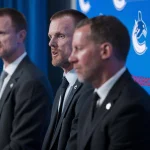 The Vancouver Canucks have an offer-sheet problem after their season collapsed May 14, 2026; Vancouver, BC, Canada; The Vancouver Canucks promoted Henrik Sedin (left), his twin brother Daniel Sedin (center) to co-presidents and Ryan Johnson (right) was named the Canucks new general manger during a press conference at Rogers Arena. Mandatory Credit: Bob Frid-Imagn Images
