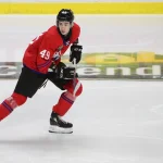 Jan 25, 2023; Langley, BC, CANADA; CHL Top Prospects team red defenseman Jordan Tourigny (49) skates during the second period in the 2023 CHL Top Prospects ice hockey game at Langley Events Centre. Mandatory Credit: Anne-Marie Sorvin-Imagn Images