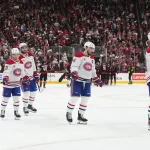 29 mai 2026 ; Raleigh, Caroline du Nord, États-Unis ; l\'ailier gauche des Canadiens de Montréal, Juraj Slafkovsky (20), patine vers le gardien Jakub Dobes (non visible sur la photo), accompagné du centre Nick Suzuki (14), des ailiers droits Cole Caufield (13) et Josh Anderson (17), et de l\'ailier gauche Alexandre Texier (85), après la défaite contre les Hurricanes de la Caroline lors du cinquième match de la finale de l\'Association de l\'Est des séries éliminatoires de la Coupe Stanley 2026.