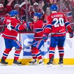 Apr 26, 2026; Montreal, Quebec, CAN; Montreal Canadiens right wing Cole Caufield (13) celebrates with center Nick Suzuki (14) and left wing Juraj Slafkovsky (20) his goal against the Tampa Bay Lightning during the second period in game four of the first round of the 2026 Stanley Cup Playoffs at Bell Centre. Mandatory Credit: David Kirouac-Imagn Images