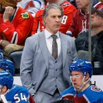 Jan 19, 2026; Denver, Colorado, USA; Colorado Avalanche head coach Jared Bednar looks on in the first period against the Washington Capitals at Ball Arena. Mandatory Credit: Isaiah J. Downing-Imagn Images