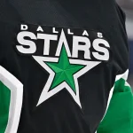 Jan 18, 2026; Dallas, Texas, USA; A view of the Dallas Stars logo on the jersey of goaltender Jake Oettinger (29) during the game at the American Airlines Center. Mandatory Credit: Jerome Miron-Imagn Images
