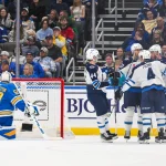 Apr 9, 2026; St. Louis, Missouri, USA; Winnipeg Jets center Jonathan Toews (19) is congratulated by teammates after scoring against St. Louis Blues goaltender Jordan Binnington (50) during the second period at Enterprise Center. Mandatory Credit: Jeff Curry-Imagn Images