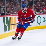 Apr 26, 2026; Montreal, Quebec, CAN; Montreal Canadiens center Kirby Dach (77) skates against the Tampa Bay Lightning during the first period in game four of the first round of the 2026 Stanley Cup Playoffs at Bell Centre. Mandatory Credit: David Kirouac-Imagn Images