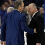 Jun 11, 2022; Tampa, Florida, USA; Tampa Bay Lightning head coach Jon Cooper and New York Rangers head coach Gerard Gallant shake hands after game six of the Eastern Conference Final of the 2022 Stanley Cup Playoffs at Amalie Arena. Mandatory Credit: Kim Klement-Imagn Images