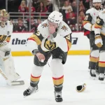 Jun 4, 2026; Raleigh, North Carolina, USA; Vegas Golden Knights defenseman Brayden McNabb (3) reacts to a puck to the face during the first period against the Carolina Hurricanes in game two of the 2026 Stanley Cup Final at Lenovo Center.