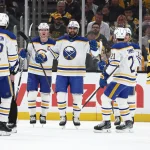 May 1, 2026; Boston, Massachusetts, USA; As Boston Bruins defenseman Charlie McAvoy (73) skates away, Buffalo Sabres right wing Alex Tuch (89) smiles at teammates after scoring during the first period of game six of the first round of the 2026 Stanley Cup Playoffs at TD Garden. Mandatory Credit: Winslow Townson-Imagn Images