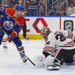 Unexpected news regarding Connor McDavid's future in Edmonton revealed by NHL insider Apr 2, 2026; Edmonton, Alberta, CAN; Chicago Blackhawks goaltender Spencer Knight (30) makes a save on Edmonton Oilers forward Connor McDavid (97) during the third period at Rogers Place. Mandatory Credit: Perry Nelson-Imagn Images