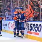 Edmonton Oilers officially tell one of their star players his time with them is over Dec 31, 2025; Edmonton, Alberta, CAN; Edmonton Oilers defenseman Darnell Nurse (25) celebrates a gaol with left winger Zach Hyman (18) and center Connor McDavid (97) against the Boston Bruins during the first period at Rogers Place. Mandatory Credit: Walter Tychnowicz-Imagn Images