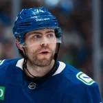 Apr 14, 2026; Vancouver, British Columbia, CAN; Vancouver Canucks forward Jake DeBrusk (74) during a stop in play against the Los Angeles Kings in the third period at Rogers Arena.
