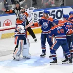 Apr 9, 2025; Edmonton, Alberta, CAN; Edmonton Oilers goalie Calvin Pickard (30) celebrates with defenseman Darnell Nurse (25) and left wing Zach Hyman (18) after defeating the St. Louis Blues at Rogers Place.