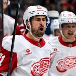 Jan 21, 2026; Toronto, Ontario, CAN; Detroit Red Wings forward Dylan Larkin (71) celebrates aftert scoring the winning goal in overtime against the Toronto Maple Leafs at Scotiabank Arena.