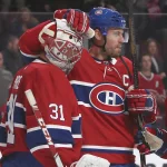 1er décembre 2018; Montréal, Québec, Canada; Le gardien de but des Canadiens de Montréal, Carey Price (31), est félicité par le défenseur Shea Weber (6) et l'ailier gauche Paul Byron (41) après une victoire contre les Rangers de New York au Centre Bell.