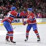 Nov 1, 2025; Montreal, Quebec, CAN; Montreal Canadiens forward Ivan Demidov (93) celebrates with teammate defenseman Lane Hutson (48) after scoring a goal against the Ottawa Senators during the third period at the Bell Centre.