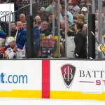 Mar 26, 2026; Las Vegas, Nevada, USA; Edmonton Oilers defenseman Jake Walman (96) shouts at Vegas Golden Knights defenseman Rasmus Andersson (4) from the bench during the second period at T-Mobile Arena.