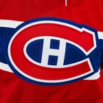 Dec 12, 2024; Montreal, Quebec, CAN; View of a Montreal Canadiens logo on a jersey worn by a member of the team during warm-up before the game against the Pittsburgh Penguins at Bell Centre.