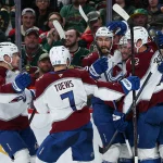 May 11, 2026; Saint Paul, Minnesota, USA; Colorado Avalanche center Ross Colton (20) celebrates his goal against the Minnesota Wild during the third period in game four of the second round of the 2026 Stanley Cup Playoffs at Grand Casino Arena.