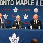 May 4, 2026; Toronto, Ontario, CANADA; Maple Leafs Sports and Entertainment CEO Keith Pelley answers media questions between Toronto Maple Leafs general manager John Chayka (left) and senior executive advisor Mats Sundin during an introductory news conference at Real Sports Bar and Grill.