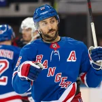 Apr 5, 2026; New York, New York, USA; New York Rangers center Vincent Trocheck (16) skates against the Washington Capitals during the second period at Madison Square Garden.