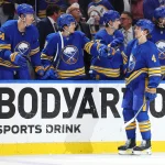 Apr 21, 2026; Buffalo, New York, USA; Buffalo Sabres defenseman Bowen Byram (4) celebrates his goal with teammates during the third period against the Boston Bruins in game two of the first round of the 2026 Stanley Cup Playoffs at KeyBank Center. Mandatory Credit: Timothy T. Ludwig-Imagn Images