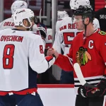 Dec 13, 2022; Chicago, Illinois, USA; Washington Capitals forward Alex Ovechkin (8) shakes hands with Chicago Blackhawks forward Jonathan Toews (19) after the Capitals defeated the Blackhawks 7-3 at United Center. Ovechkin scored three goals to reach 800 goals in his NHL career.