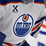 Mar 12, 2026; Dallas, Texas, USA; A view of the logo on the jersey of Edmonton Oilers goaltender Tristan Jarry (35) during the game between the Stars and the Oilers at the American Airlines Center.