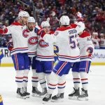 May 14, 2026; Buffalo, New York, USA; Montréal Canadiens right wing Cole Caufield (13) celebrates his goal with teammates during the first period against the Buffalo Sabres in game five of the second round of the 2026 Stanley Cup Playoffs at KeyBank Center. Mandatory Credit: Timothy T. Ludwig-Imagn Images