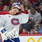 Jan 17, 2026; Ottawa, Ontario, CAN; Montreal Canadiens goaltender Samuel Montembeault (35) dons his mask during a break in the first period against the Ottawa Senators at the Canadian Tire Centre. Mandatory Credit: Marc DesRosiers-IMAGN Images