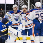 May 21, 2025; Dallas, Texas, USA; Edmonton Oilers center Connor McDavid (97) and center Adam Henrique (19) practice before game one of the Western Conference Final of the 2025 Stanley Cup Playoffs at American Airlines Center.