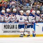Mar 13, 2026; St. Louis, Missouri, USA; Edmonton Oilers right wing Kasperi Kapanen (42) is congratulated by teammates after scoring against the St. Louis Blues during the second period at Enterprise Center.