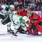 Nov 11, 2025; Ottawa, Ontario, CAN; Ottawa Senators goalie Linus Ullmark (35) makesa save against Dallas Stars left wing Jason Robertson (21) and right wing Miko Rantanen (96) in the second period at the Canadian Tire Centre.