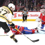 Dec 12, 2016; Montreal, Quebec, CAN; Boston Bruins center Patrice Bergeron (37) shoots on Montreal Canadiens goalie Carey Price (31) as defenseman Shea Weber (6) defends during the second period at Bell Centre.