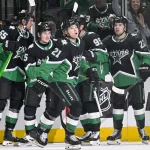 Apr 20, 2026; Dallas, Texas, USA; Dallas Stars defenseman Thomas Harley (55) and defenseman Nils Lundkvist (5) and left wing Jason Robertson (21) and right wing Mikko Rantanen (96) and center Mavrik Bourque (22) celebrates a goal scored by Robertson during the game between the Stars and the Wild in game two of the first round of the 2026 Stanley Cup Playoffs at American Airlines Center.