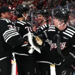 Nov 26, 2025; Newark, New Jersey, USA; New Jersey Devils defenseman Simon Nemec (17) celebrates his game winning overtime goal against the St. Louis Blues at Prudential Center.