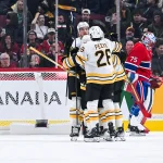 Mar 17, 2026; Montreal, Quebec, CAN; Boston Bruins center Pavel Zacha (18) celebrates his second goal of the game against the Montreal Canadiens with his teammates during the second period at Bell Centre.