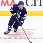 Sep 25, 2017; Toronto, Ontario, CAN; Toronto Maple Leafs defenceman Morgan Reilly (44) skates with the puck against Montreal Canadiens in the third period at Ricoh Coliseum.