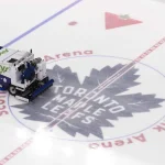 Mar 25, 2026; Toronto, Ontario, CAN; A zamboni ice machine cleans the Toronto Maple Leafs logo at cener ice before warm up for a game against the New York Rangers at Scotiabank Arena.