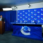 May 14, 2026; Vancouver, BC, Canada; Vancouver Canucks owner Francesco Aquilini speaks at the podium during a press conference where the Canucks name new senior management staff. Henrik Sedin and his twin brother Daniel Sedin have been appointed as co-presidents of hockey operations and Ryan Johnson is now the new general manager of the club at Rogers Arena.
