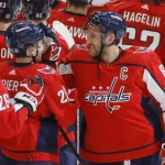 Oct 13, 2021; Washington, District of Columbia, USA; Washington Capitals left wing Alex Ovechkin (8) celebrates with Capitals center Hendrix Lapierre (29) after their game against the New York Rangers at Capital One Arena.